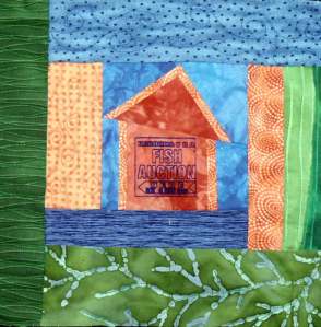 small quilt featuring boatshed
